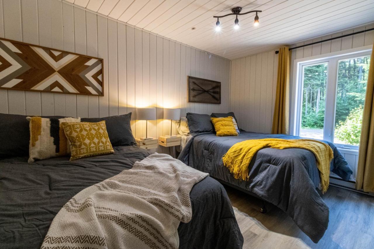 Les Chalets Tourisma - Chalet Dans Les Bois Avec Lac Prive - Le Colibri Saint-Raymond Exterior foto